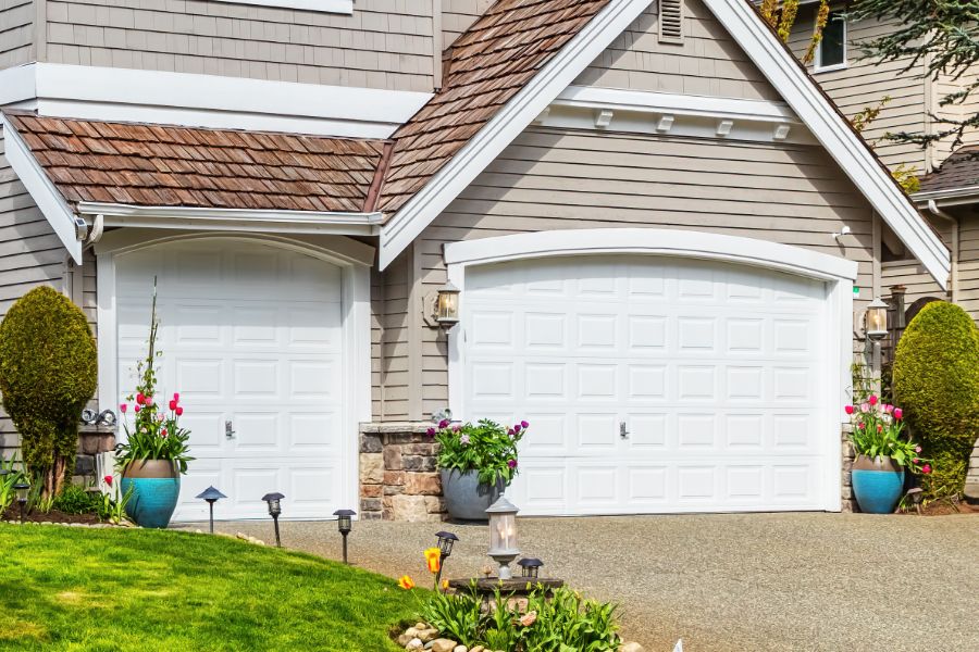 Residential garage door in Braddock, VA representing Door Doctor repair and installation services
