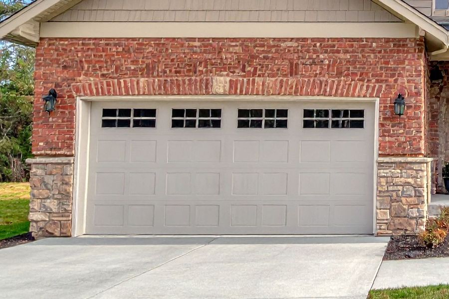 Residential garage door in Chantilly VA representing Door Doctor repair and installation services