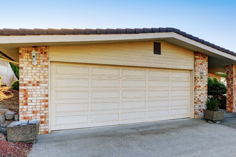 Residential garage door in Fairfax Station VA representing Door Doctor repair and installation services