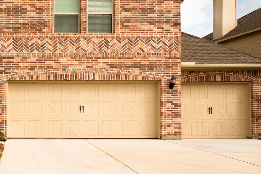 Residential garage door in Falls Church VA representing Door Doctor repair and installation services