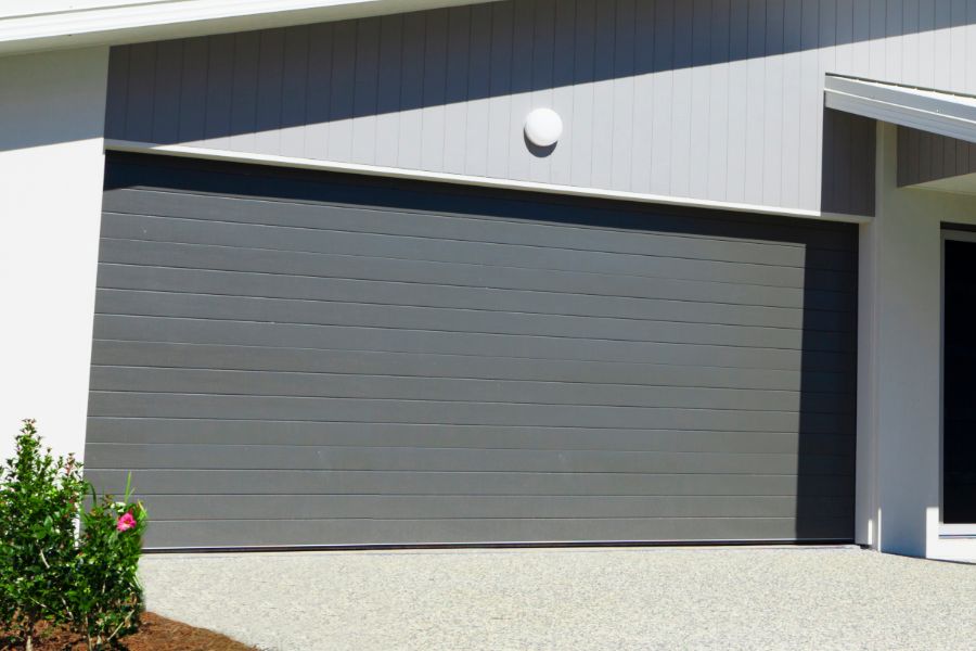 Residential garage door in Great Falls VA representing Door Doctor repair and installation services