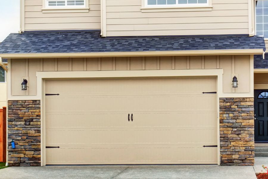 Residential garage door in Herndon VA representing Door Doctor repair and installation services