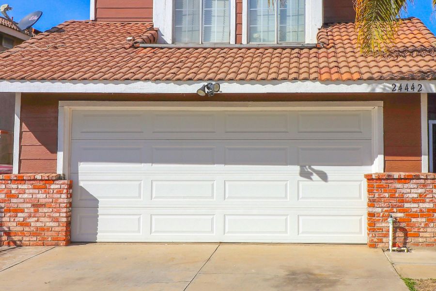 Residential garage door in Leesburg VA representing Door Doctor repair and installation services