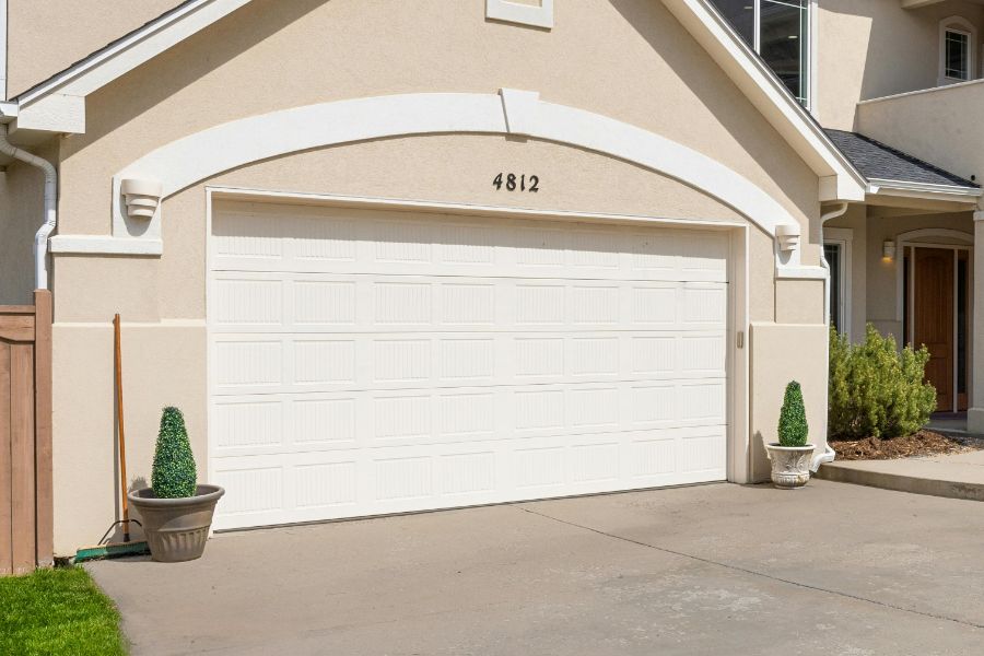 Residential garage door in Lorton VA representing Door Doctor repair and installation services
