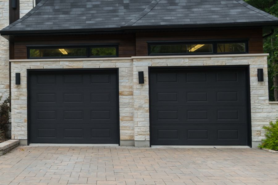Residential garage door in Manassas VA representing Door Doctor repair and installation service