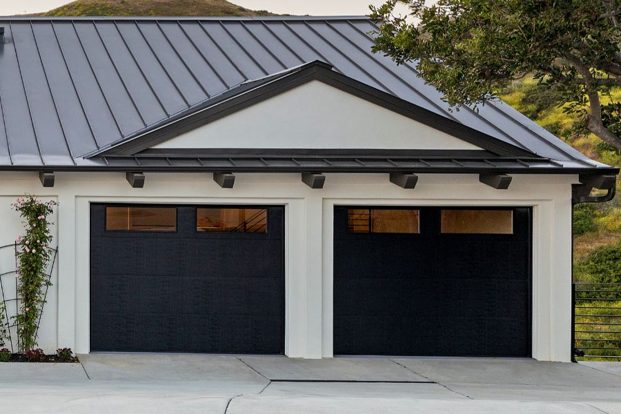Residential garage door in Merrifield, VA representing Door Doctor repair and installation services

