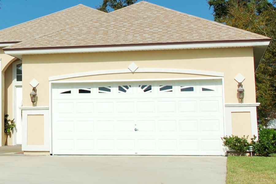Residential garage door in Potomac Falls VA representing Door Doctor repair and installation services