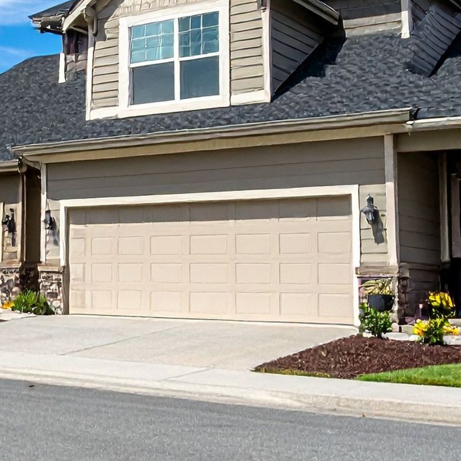 Gainesville VA home with updated garage door serviced by local company Door Doctor
