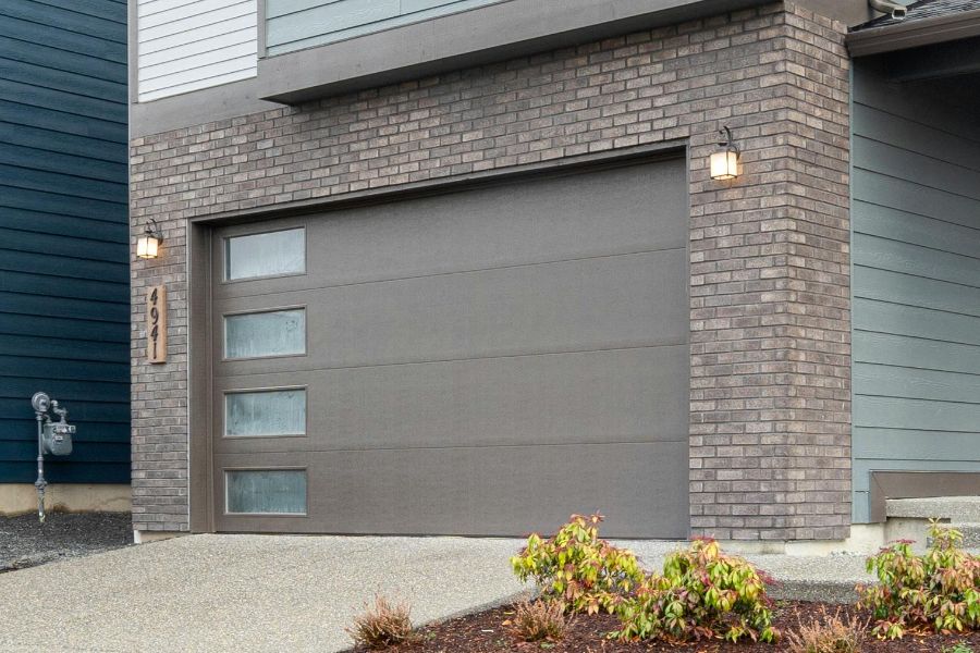 Residential garage door in Cascades, VA representing Door Doctor repair and installation services 