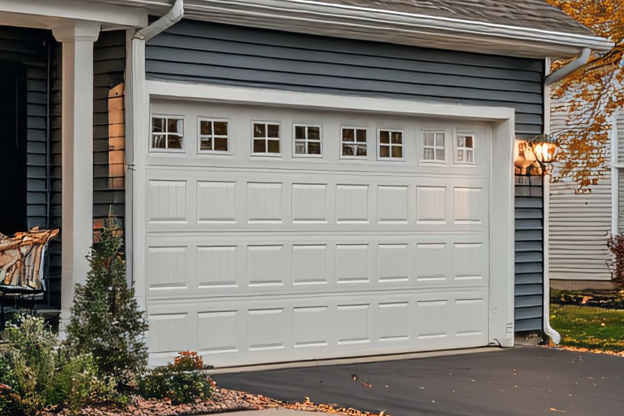 Residential garage door in Stone Ridge, VA representing Door Doctor repair and installation services 
